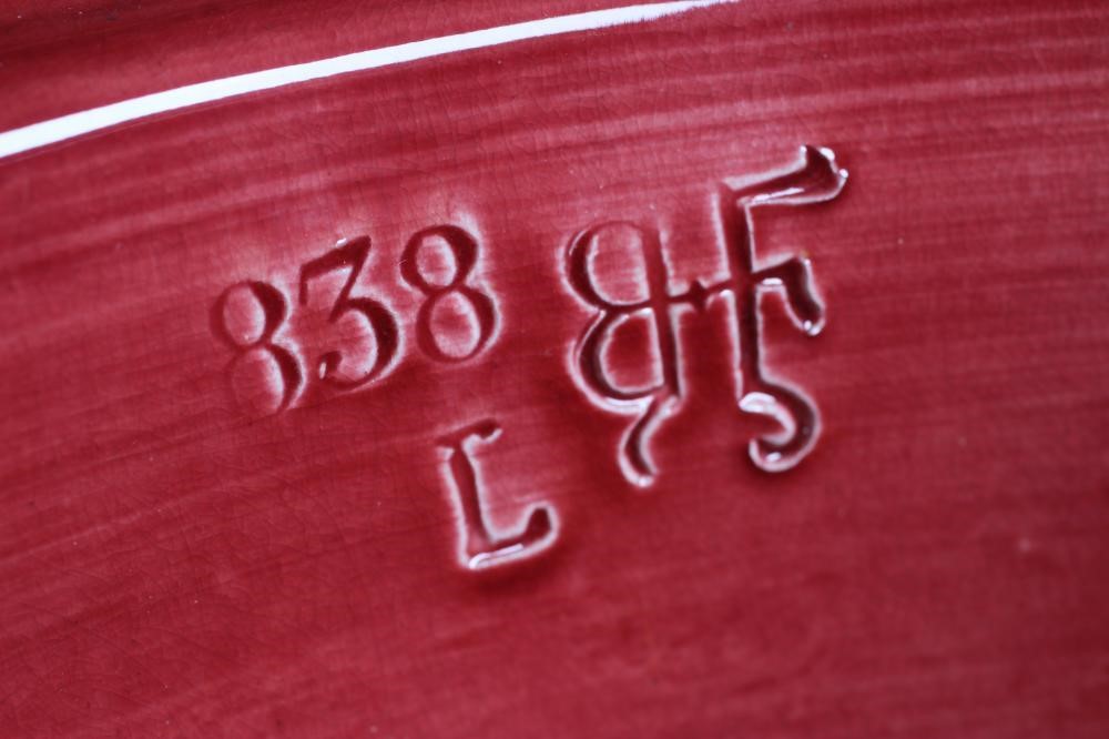 A BURMANTOFTS PINK GLAZED "FAIENCE" JARDINIERE AND STAND Image