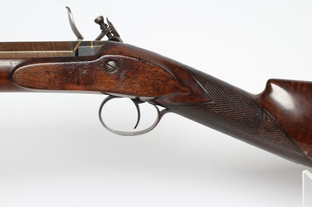 A FLINTLOCK SPORTING GUN by Fisher of London Image