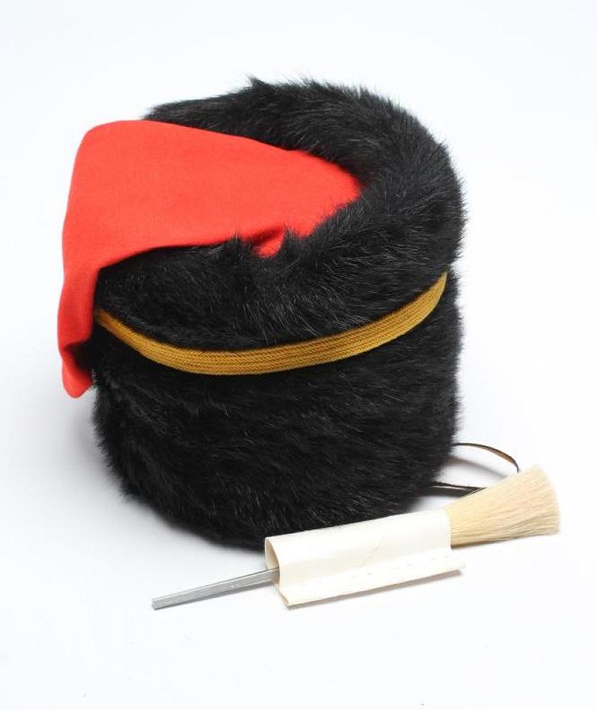 A ROYAL CANADIAN HORSE ARTILLERY BEAR SKIN DRESS HAT with interior label for Scully of Montreal Image