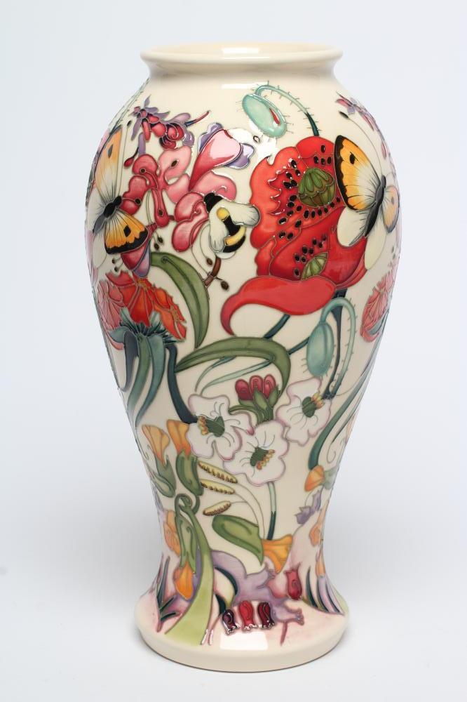 A MOORCROFT POTTERY FAMILY THROUGH FLOWERS PATTERN VASE Image