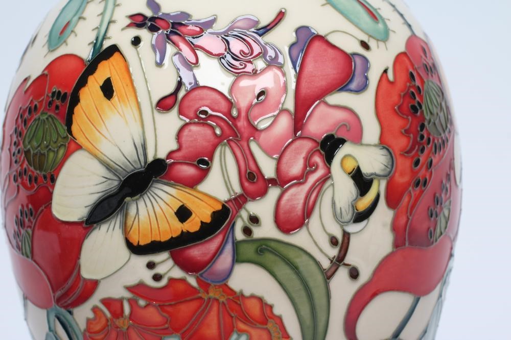 A MOORCROFT POTTERY FAMILY THROUGH FLOWERS PATTERN VASE Image