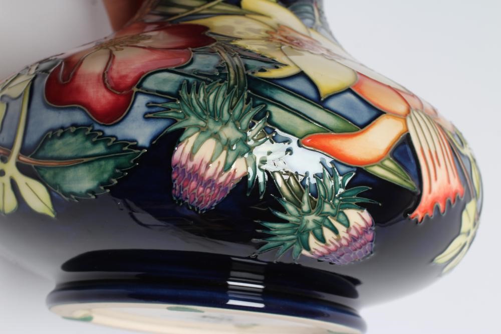 A MOORCROFT POTTERY GOLDEN JUBILEE PATTERN VASE AND JUG Image