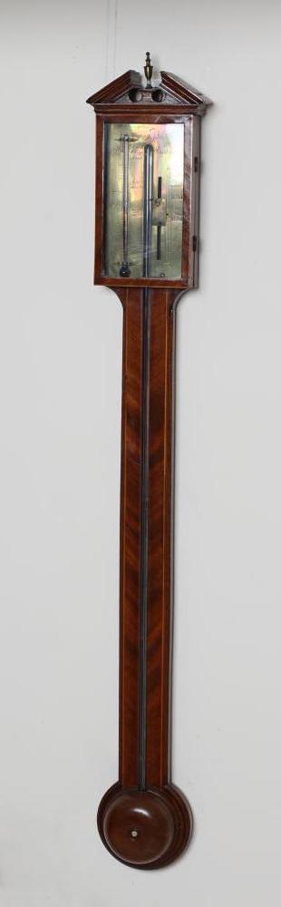 A MAHOGANY STICK BAROMETER by J. Valanterio & Co. Image