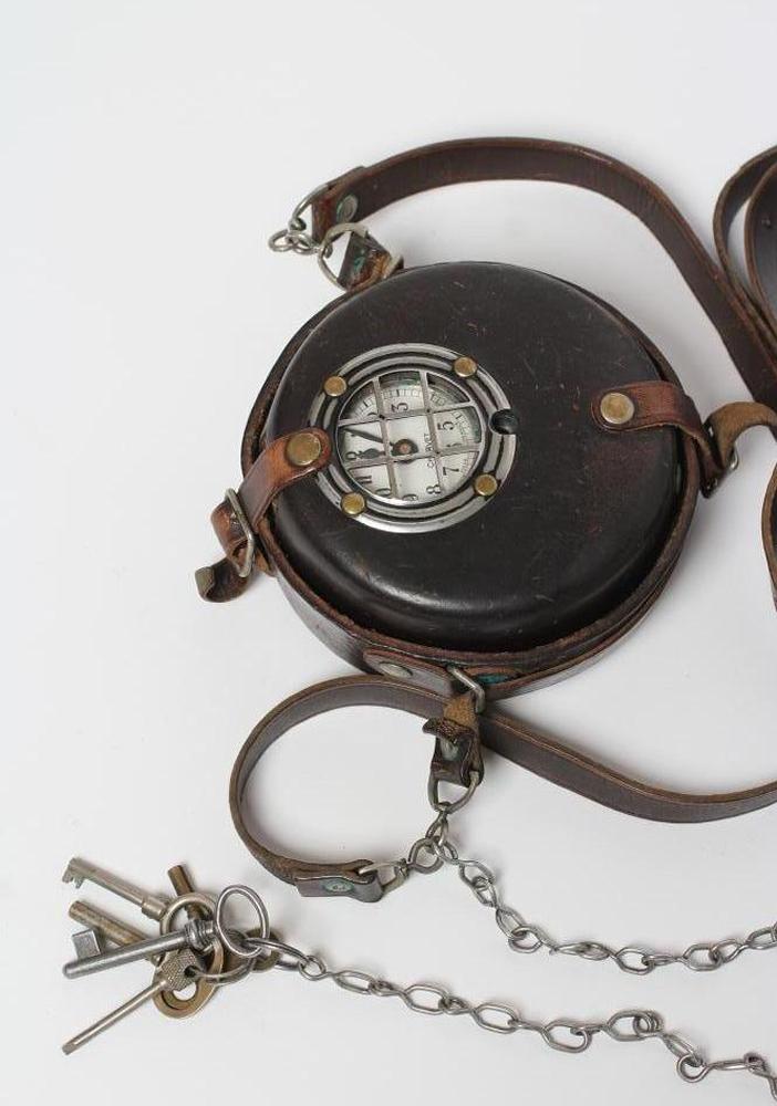 A FRENCH CHROME PLATED MILITARY RECORDING CLOCK with recording paper punch Image