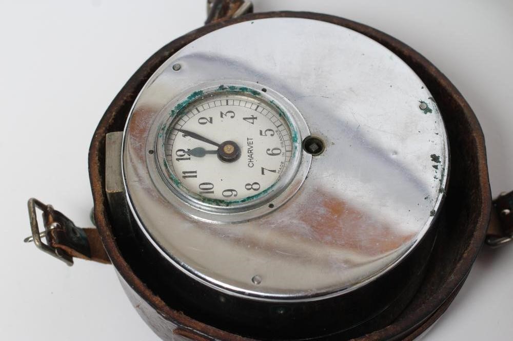 A FRENCH CHROME PLATED MILITARY RECORDING CLOCK with recording paper punch Image