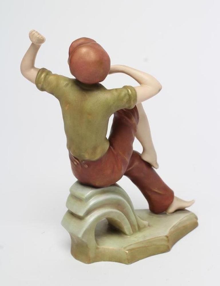 A ROYAL DUX BISQUE PORCELAIN FIGURE Image