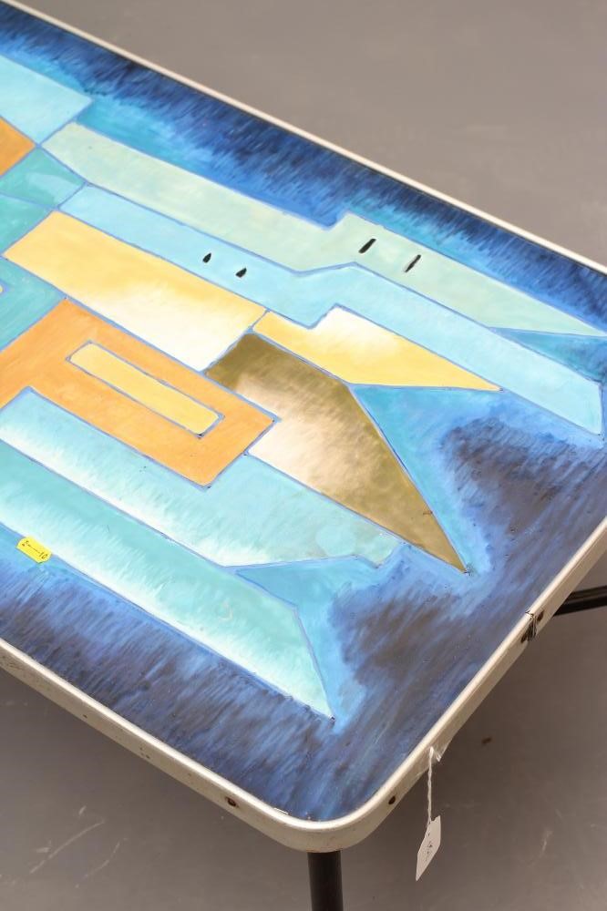 A METAL AND TEAK COFFEE TABLE Image