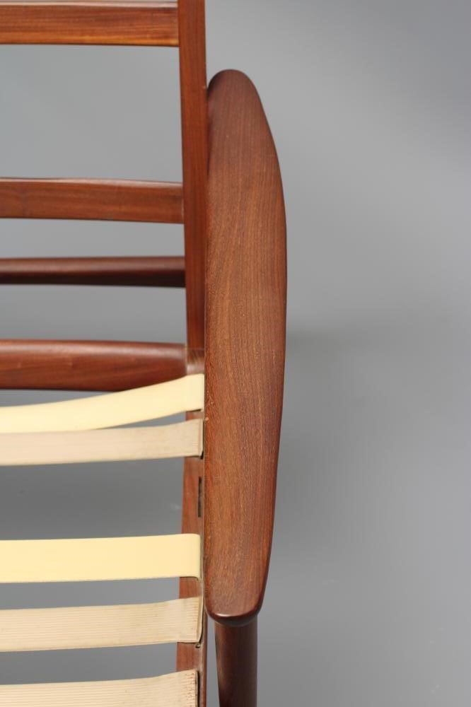 A RETRO TEAK FRAMED ARMCHAIR Image