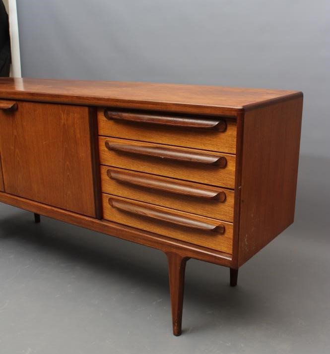 A TEAK SIDEBOARD by Younger Ltd. Image