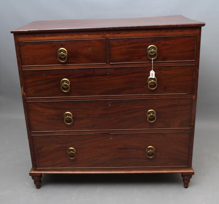 A REGENCY MAHOGANY CHEST of two short and three long cockbeaded drawers Image