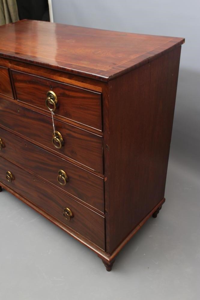 A REGENCY MAHOGANY CHEST of two short and three long cockbeaded drawers Image