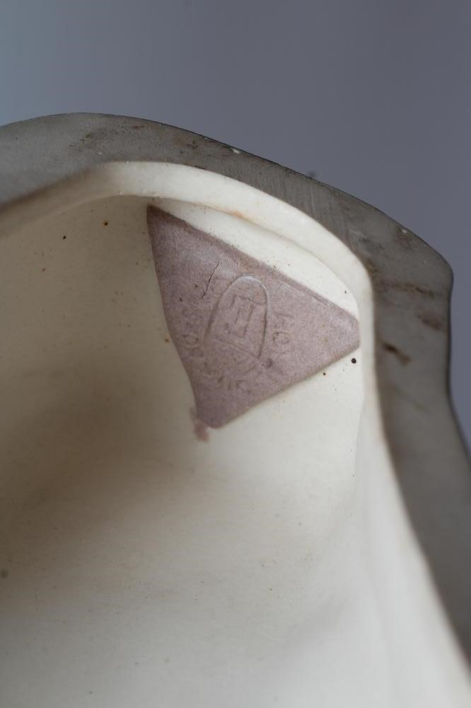 A ROYAL DUX BISQUE PORCELAIN SETTER Image