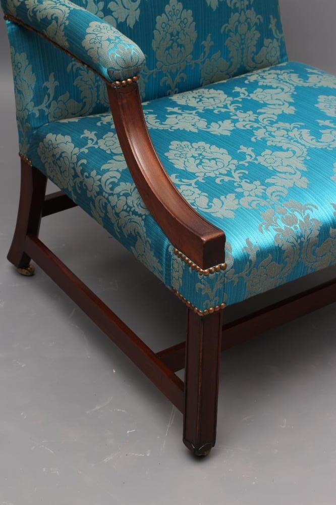 A MAHOGANY FRAMED GAINSBOROUGH STYLE LIBRARY CHAIR Image