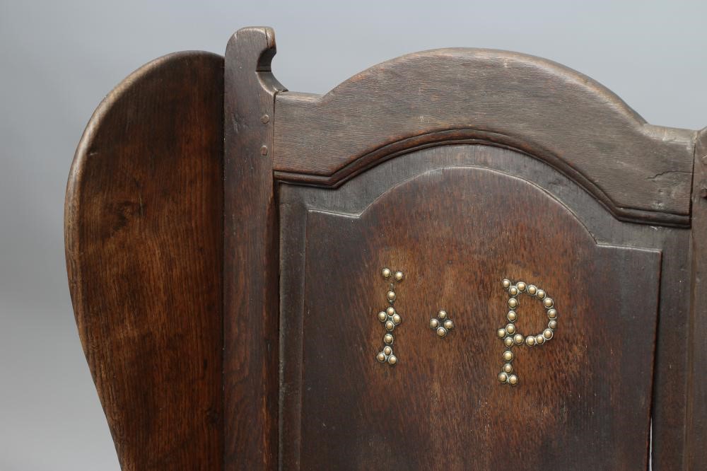 A JOINED OAK LAMBING WING ARMCHAIR Image