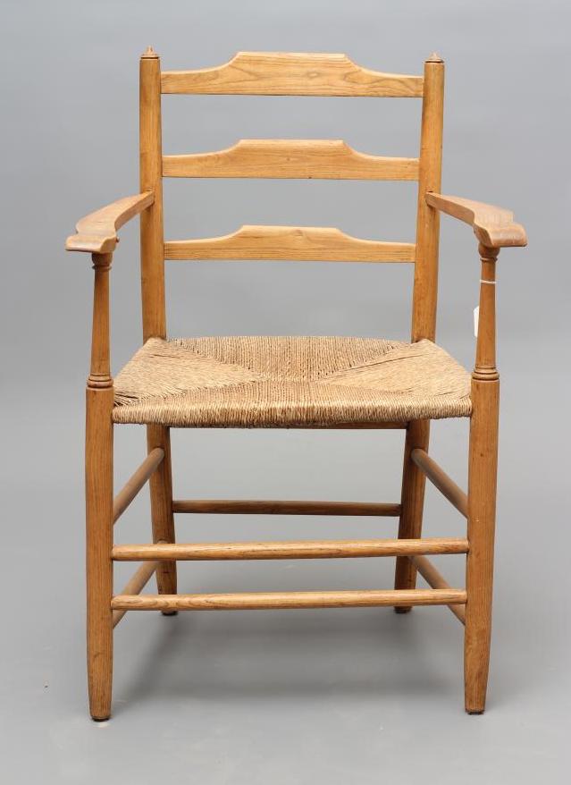 AN ARTS AND CRAFTS ELBOW CHAIR Image