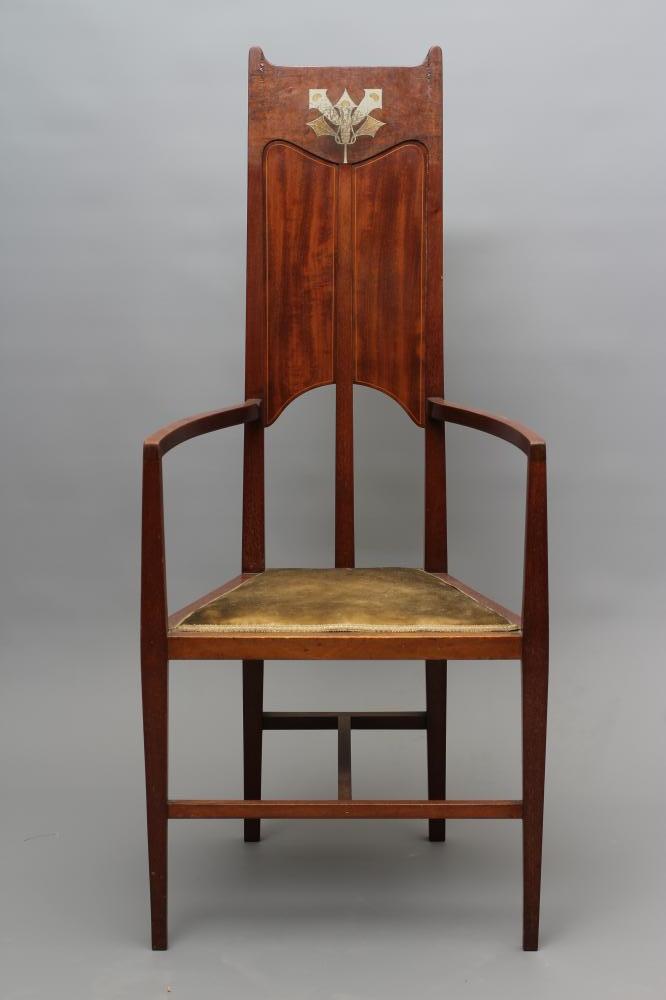 AN ARTS AND CRAFTS "CAQUETEUSE" STYLE MAHOGANY ELBOW CHAIR Image