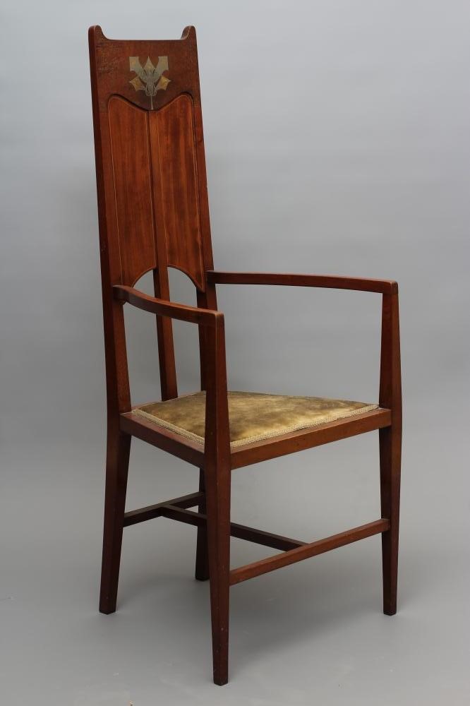 AN ARTS AND CRAFTS "CAQUETEUSE" STYLE MAHOGANY ELBOW CHAIR Image