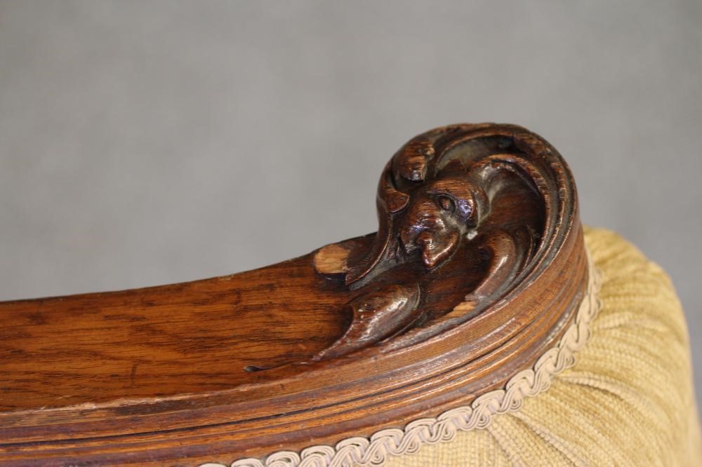 A GENTLEMAN'S VICTORIAN OAK FRAMED ARMCHAIR upholstered in gold chenille Image