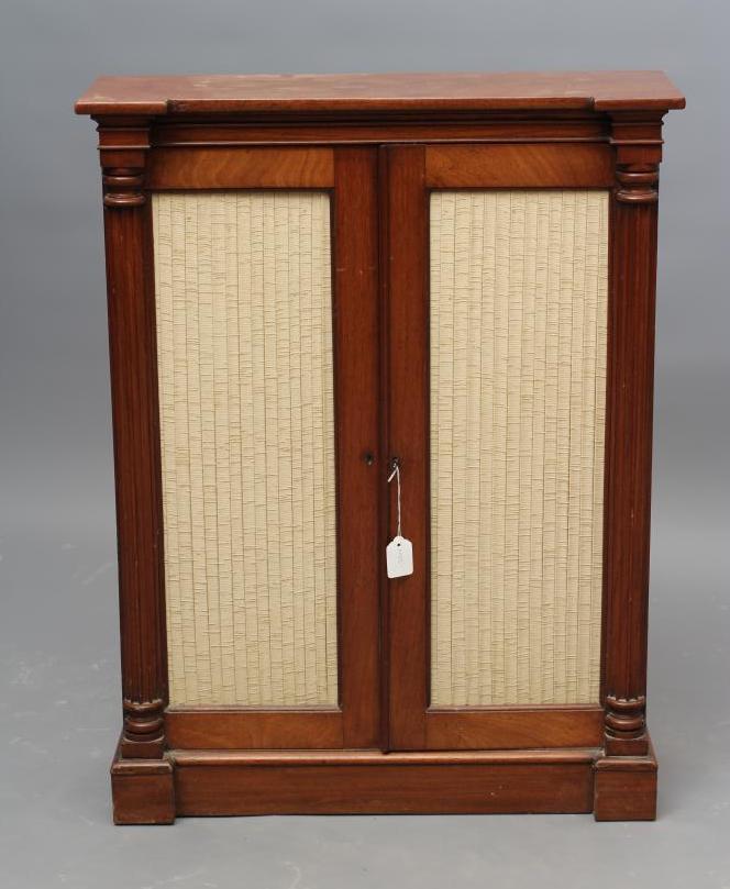 A REGENCY MAHOGANY SMALL PIER CABINET of inverted breakfront form Image