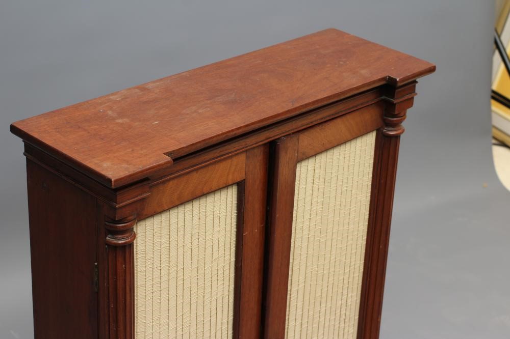 A REGENCY MAHOGANY SMALL PIER CABINET of inverted breakfront form Image