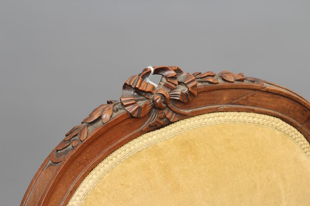 A VICTORIAN ROSEWOOD ARMCHAIR in the Louis XVI style Image