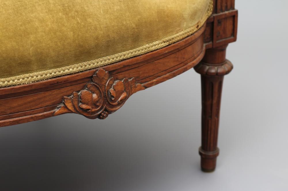 A VICTORIAN ROSEWOOD ARMCHAIR in the Louis XVI style Image