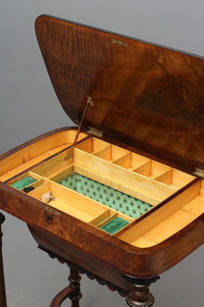A VICTORIAN WALNUT AND EBONISED SEWING TABLE Image