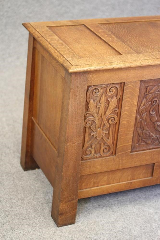 AN ARTS AND CRAFTS STYLE OAK PANELLED CHEST Image