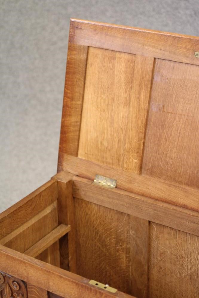 AN ARTS AND CRAFTS STYLE OAK PANELLED CHEST Image