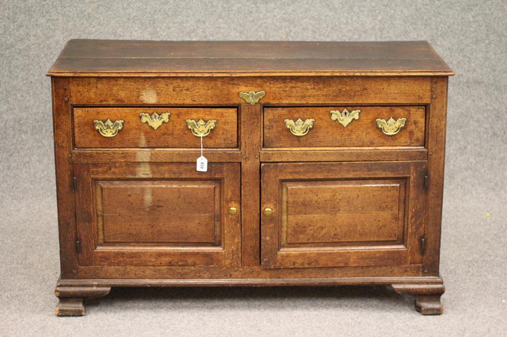 AN OAK ENCLOSED DRESSER Image