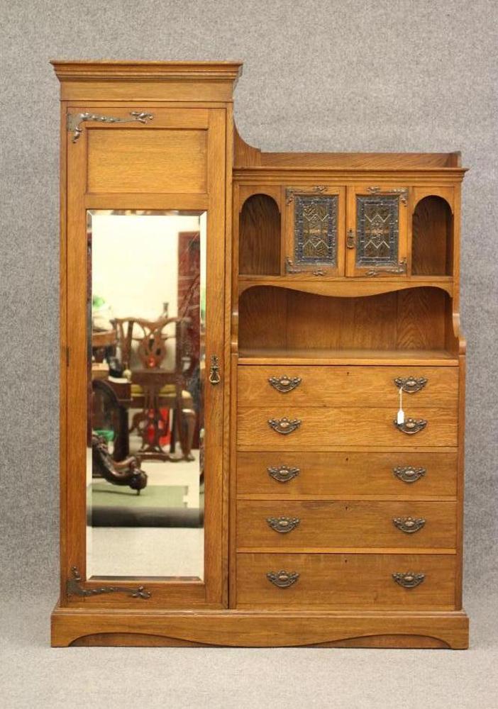 A GENTLEMAN'S ARTS AND CRAFTS STYLE OAK WARDROBE Image
