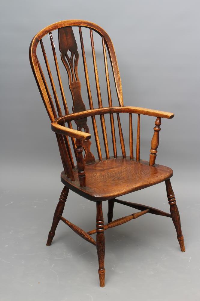 A  WINDSOR SPINDLE BACK ARMCHAIR in ash and elm Image