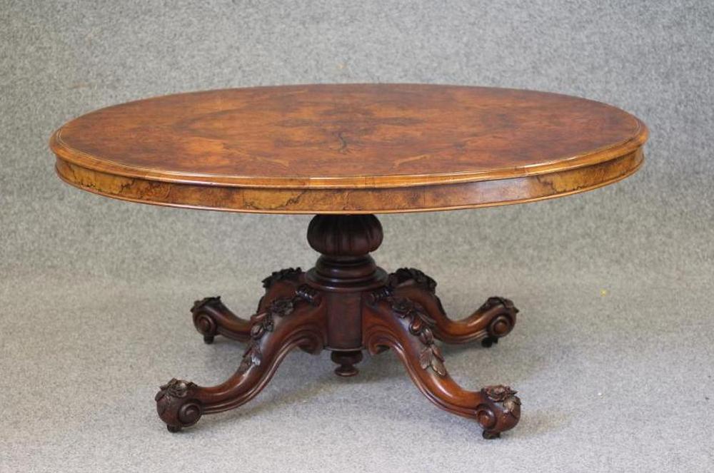 A VICTORIAN WALNUT LOO TABLE Image