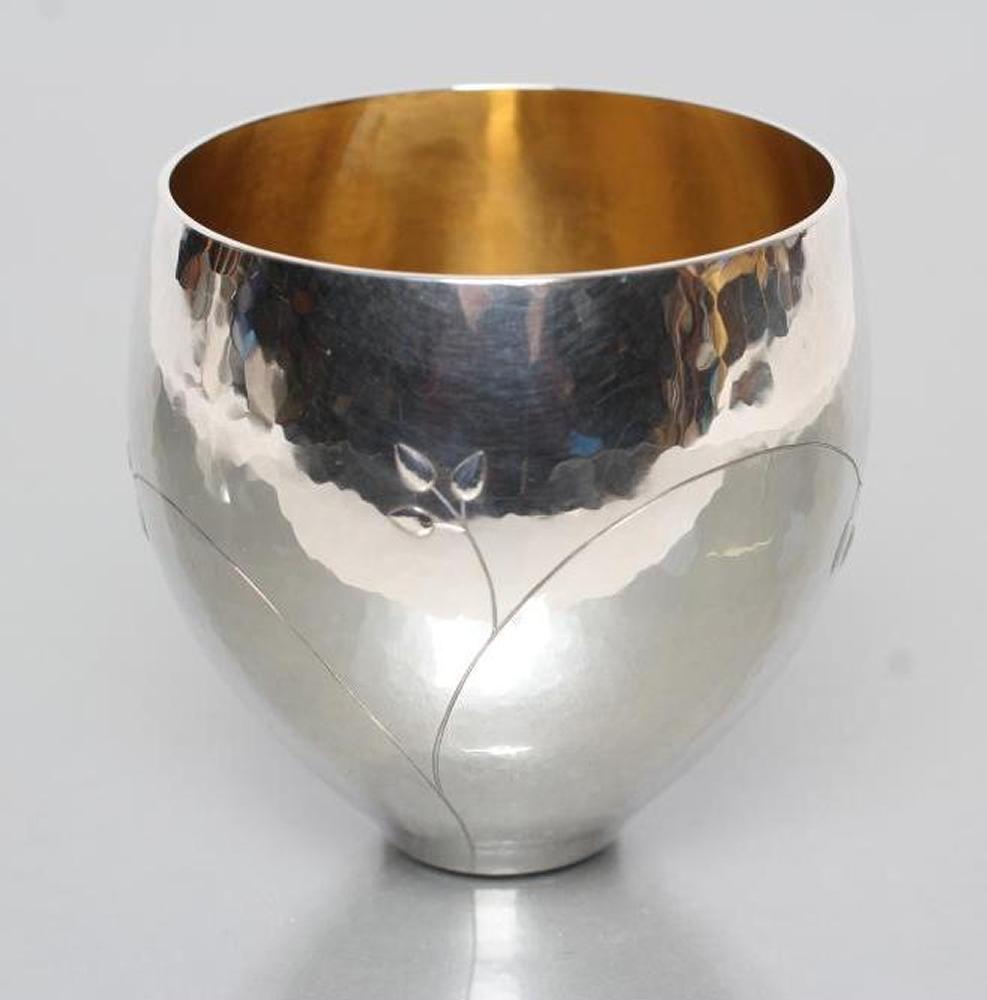 A SMALL SILVER BOWL Image