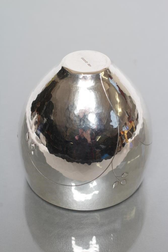 A SMALL SILVER BOWL Image