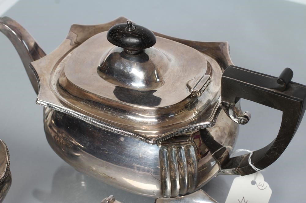 A SILVER THREE PIECE TEA SERVICE Image