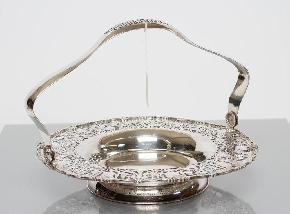 A SILVER FRUIT BASKET Image