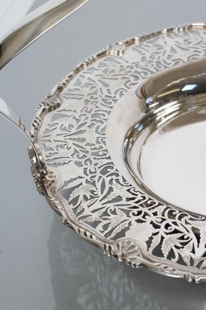 A SILVER FRUIT BASKET Image