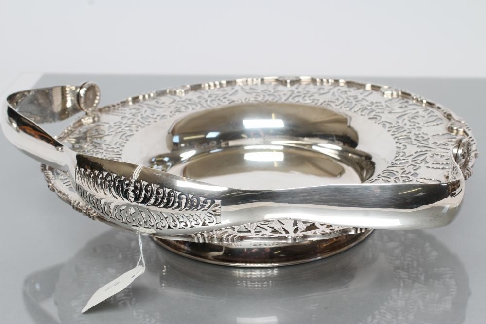 A SILVER FRUIT BASKET Image