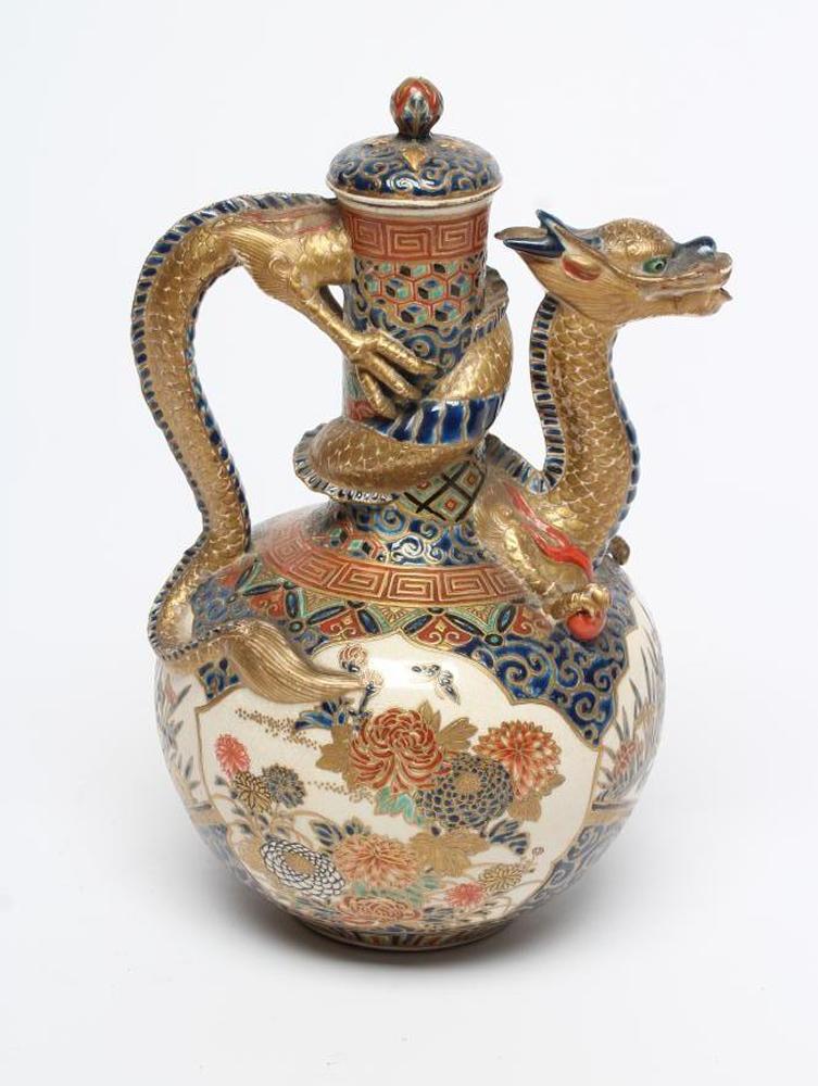 A SATSUMA EARTHENWARE EWER AND COVER Image