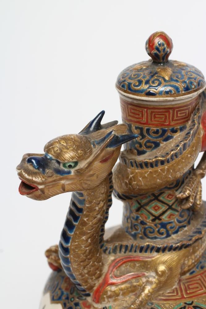 A SATSUMA EARTHENWARE EWER AND COVER Image