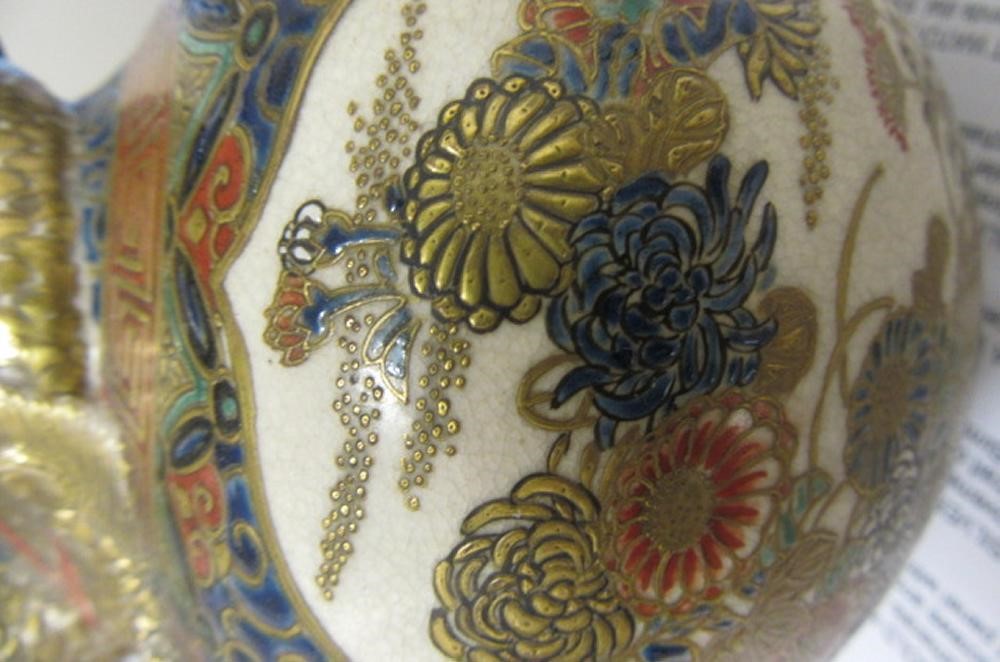 A SATSUMA EARTHENWARE EWER AND COVER Image