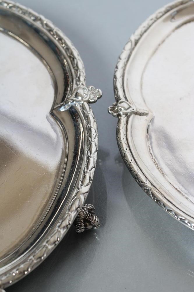 TWO GRADUATED SILVER SALVERS Image