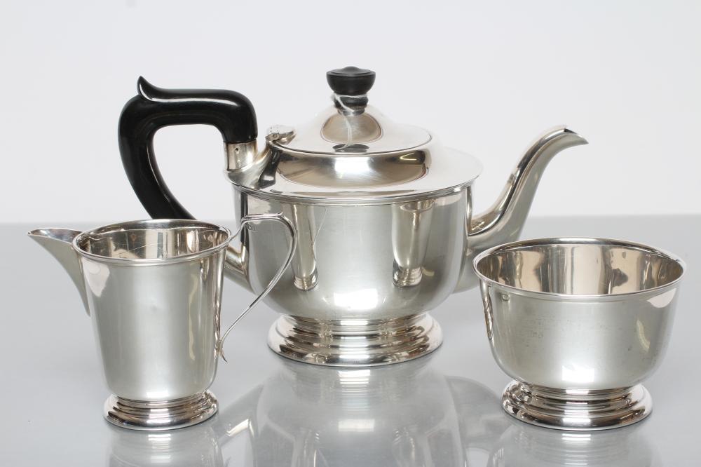 A SILVER THREE PIECE TEA SERVICE Image