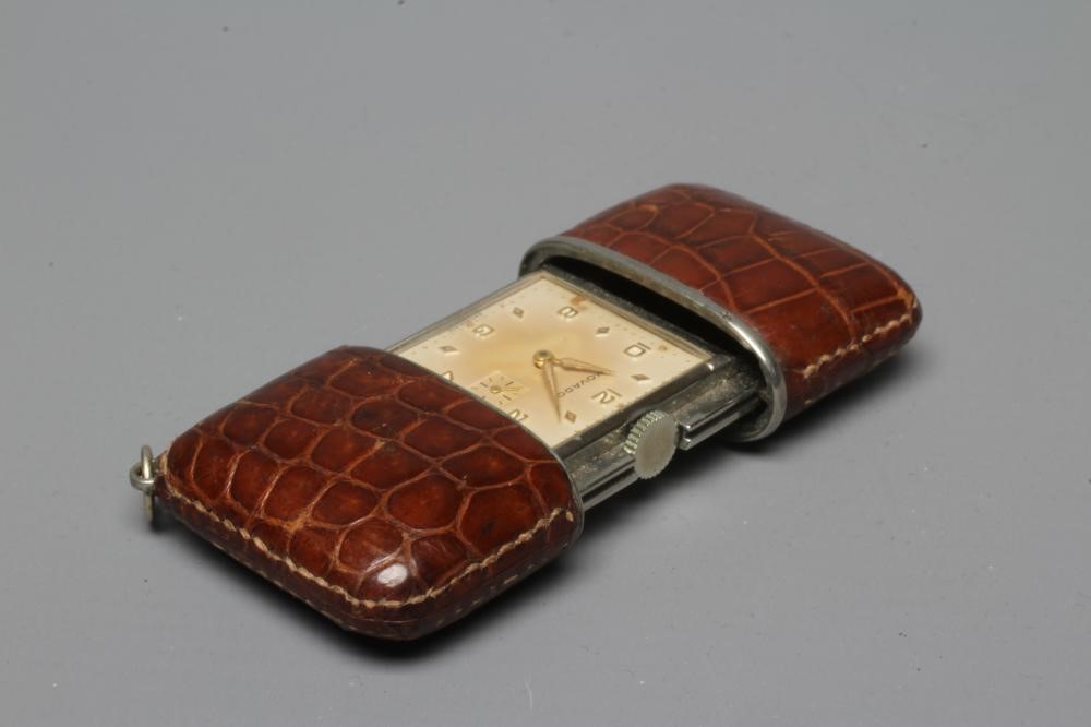AN ART DECO MOVADO TRAVELLING PURSE WATCH Image