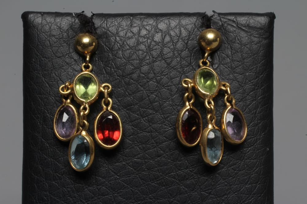 A PAIR OF MULTI-GEM CHANDELIER EARRINGS collet set with an oval facet cut aquamarine, peridot, Image