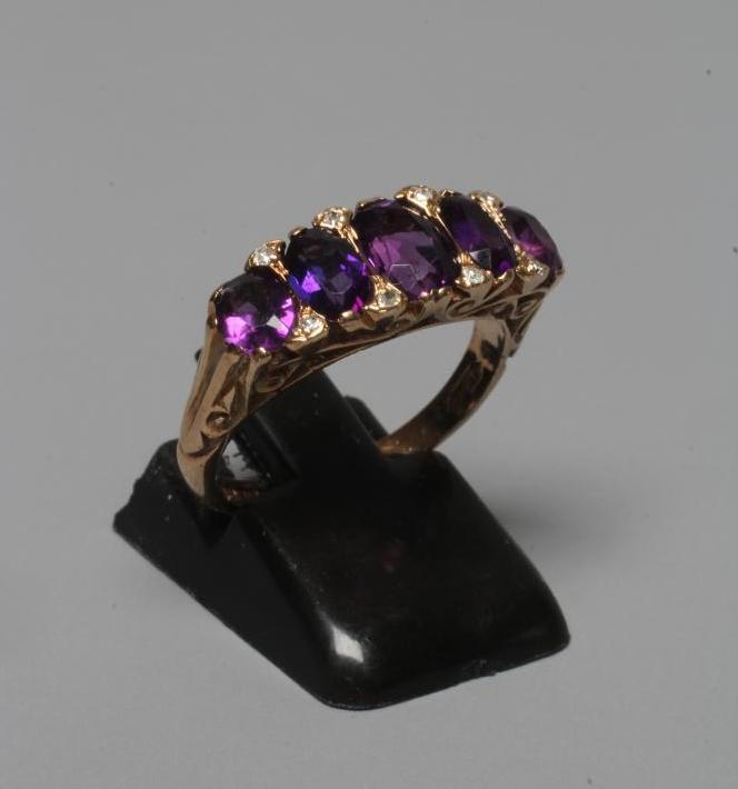 AN AMETHYST AND DIAMOND DRESS RING Image