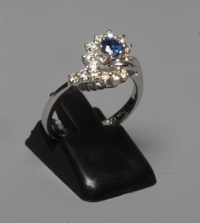 A SAPPHIRE AND DIAMOND ABSTRACT CLUSTER RING Image