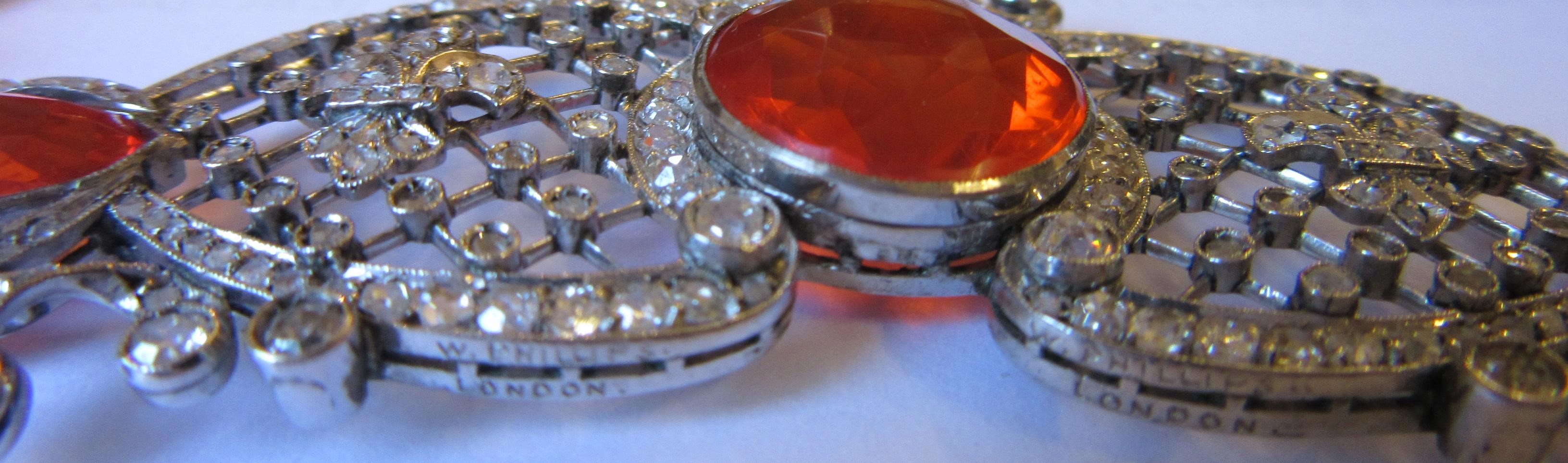 A FIRE OPAL AND DIAMOND NECKLACE BY W. PHILLIPS Image