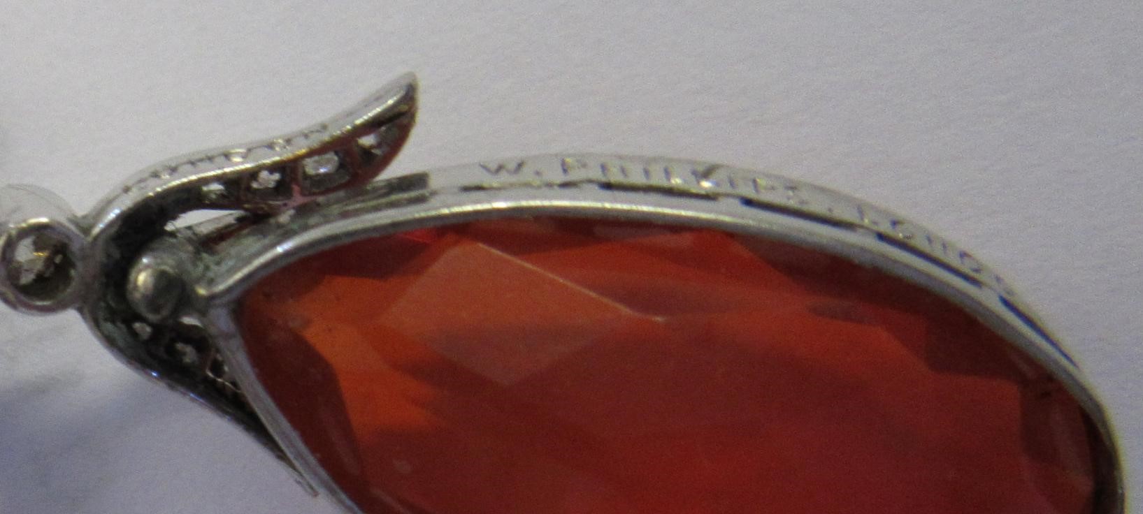 A FIRE OPAL AND DIAMOND NECKLACE BY W. PHILLIPS Image